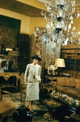 coco-chanel-standing-in-sitting-room-no-5-chandelier-Chanel-31-rue-cambon